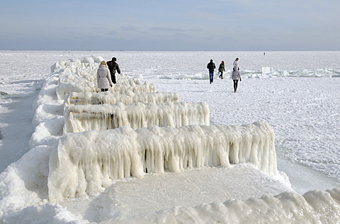 People on icy pier, frozen Black Sea, a rare phenomenon, Odessa, Ukraine, Eastern Europe