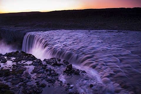 Dettifoss waterfall on the JoekulsâˆšÂ° âˆšÂ° Fjoellum river in evening light, Norâˆšâˆžurland eystra, north-eastern Iceland, Iceland, Europe