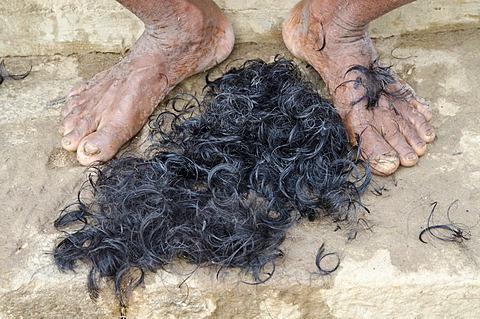 Shaving head and beard is part of the ritual to bid farewell to the soul of a deceased person, at the ghats of Varanasi, Uttar Pradesh, India, Asia