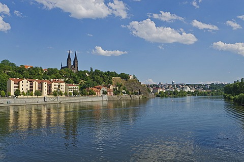 Vyoeehrad with the Church of St. Peter and Paul, seen across river Vltava, Prague, Czech Republic, Europe