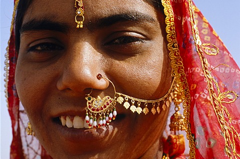 Indian woman with jewellery worn for special occasions like weddings, Jaisalmer, Rajasthan, India, Asia