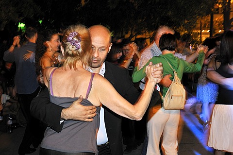 Dancing couples at a Milonga, tango event on the Plaza Dorrego square in the traditional San Telmo neighbourhood, Buenos Aires, Argentina, South America