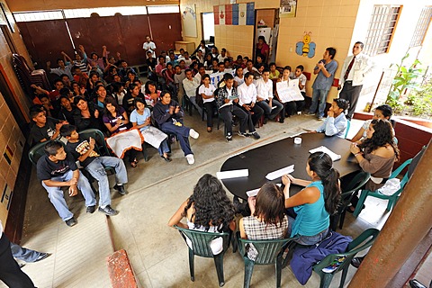 Students of the Escuela Ceiba school staging an election campaign, panel discussion, as part of their social studies class prior to the upcoming parliamentary elections, Lomas de Santa Faz slum, Guatemala City, Guatemala, Central America