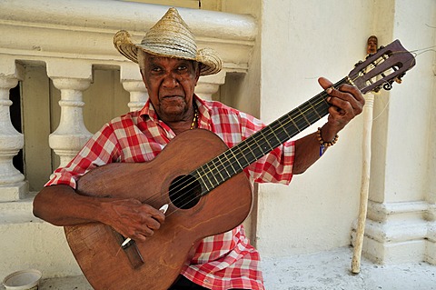 Street musician, busker, guitarist, Santiago de Cuba, Cuba, Caribbean