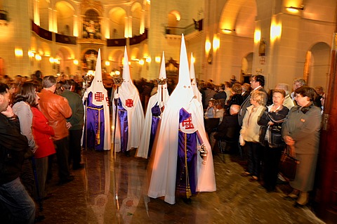 Penitents, Nazarenos, in their typical hooded robes during the festivities of Semana Santa, Holy Week, procession, Good Friday, Alicante, Costa Blanca, Spain, Europe