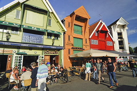 Tourists sitting outside a restaurant in the picturesque old town of Stavanger, Rogaland, Norway, Scandinavia, Europe