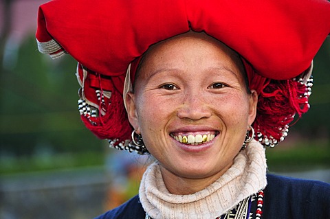 Woman from the Red Dzao ethnic minority group, a mountain tribe, at the market of Sapa or Sa Pa, northern Vietnam, Vietnam, Asia