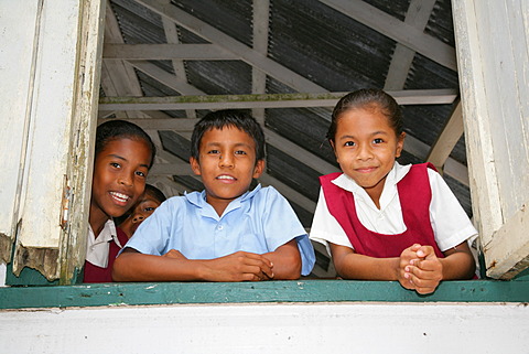 Pupils in uniform during break, Amerindians, tribe of the Arawak, Santa Mission, Guyana, South America