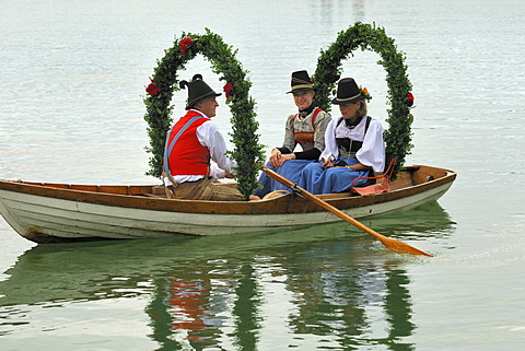 Church boat with people wearing traditional costumes at the Alt-Schliersee churchday, Lake Schliersee, Upper Bavaria, Germany, Europe