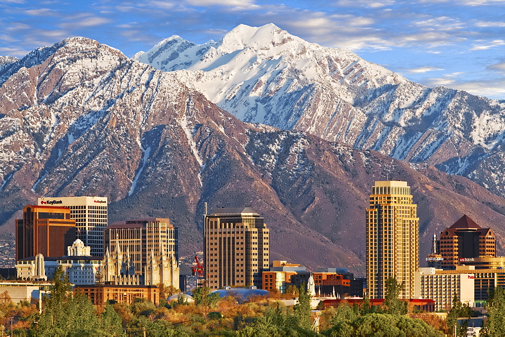 Skyline of downtown Salt Lake City with the towering Wasatch Mountain range at back, Utah, USA