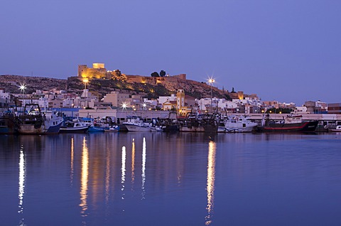 View fo the harbour of Almeria and Alcazaba at dusk, Andalusia, Spain, Europe