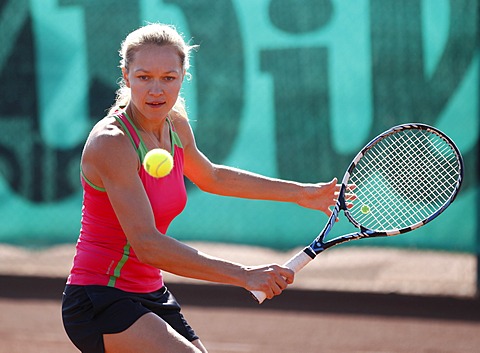 Young woman playing tennis in a holiday club, Manavgat, Turkey