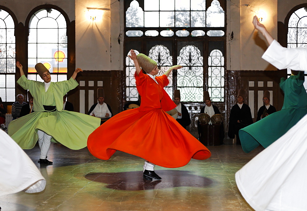 Ceremony of the dancing dervishes of the Sufi order Mevlevi, Sema ceremony, historic train station Sirkeci, Istanbul, Turkey