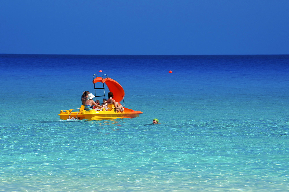 Tourists in a boat, Nissi Beach, Ayia Napa, Southern Cyprus, Cyprus