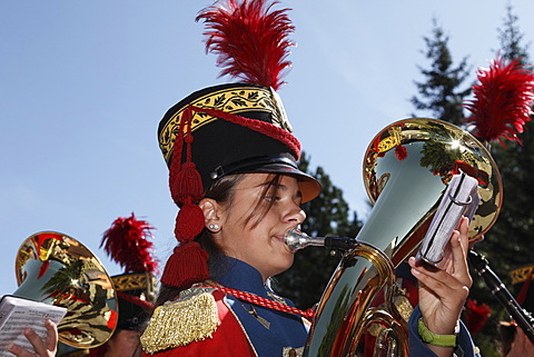 Young woman playing the tuba, local music group, at the Samson Parade, St. Michael, Lungau, Salzburg state, Salzburg, Austria, Europe