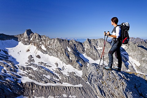 Mountain climber ascending Hochfeiler Mountain, Pfitschertal Valley, in front of the Dolomites, Alto Adige, Italy, Europe