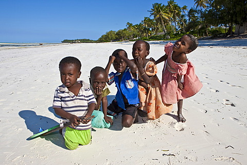 A group of children on the beach at Pingwe, Zanzibar, Tanzania, Africa