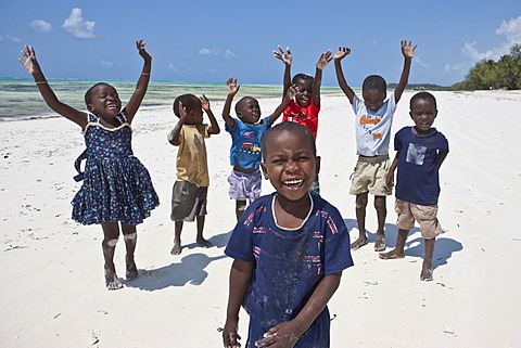 Children playing on the beach, Zanzibar, Tanzania, Africa