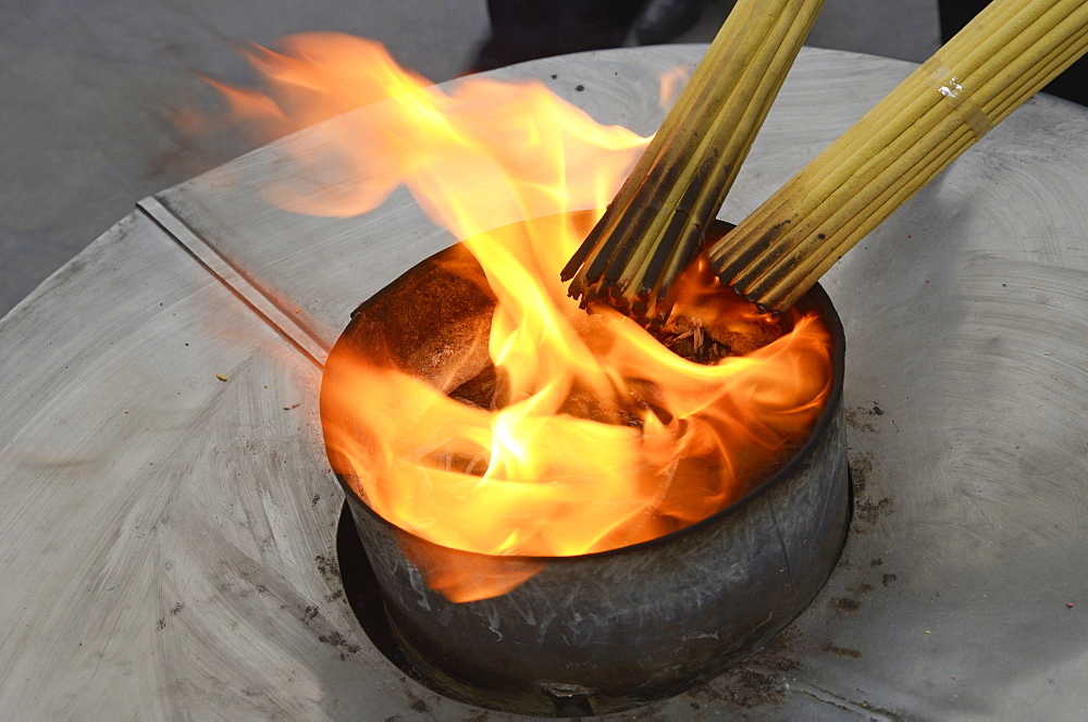 Incense sticks being lit, Shanghai, China, Asia