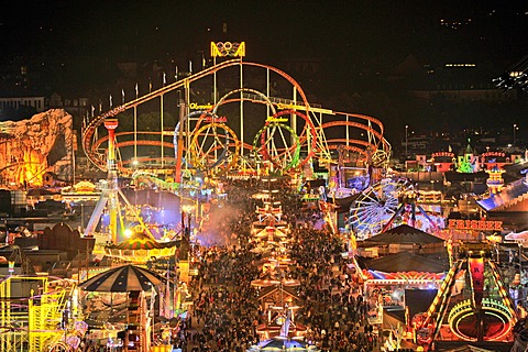 View of the Oktoberfest festival at night, with illuminated stalls, beer tents and funfair rides, Oktoberfest festival, Munich, Upper Bavaria, Bavaria, Germany, Europe