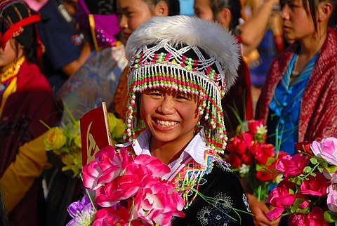 Festival, young Hmong woman, portrait, dressed in traditional clothing, colourful headwear, Xam Neua, Houaphan province, Laos, Southeast Asia, Asia