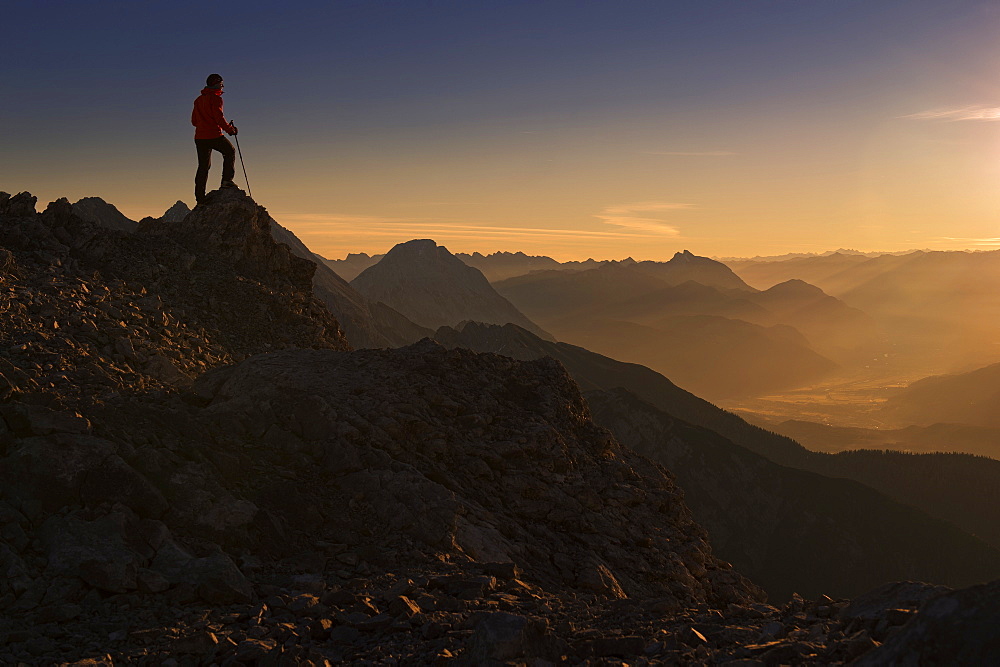 Mountaineer, sunrise above the Inn Valley, Ehrwald, Tyrol, Austria