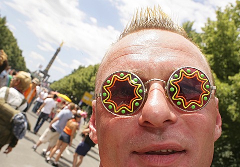 Man with oddities glasses at the love parade in Berlin, Germany