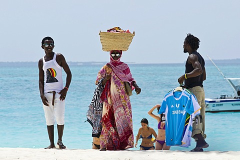 Souvenir vendors on the beach of Kendwa Rocks, north coast of Zanzibar, Tanzania, Africa