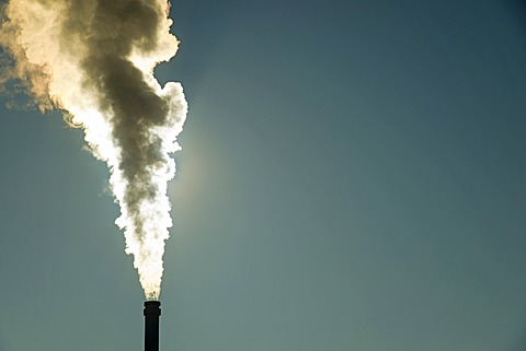 Smoking chimney of a modern biomass-fired power station, SchwâˆšÂ§bische Alb, Ulm, Baden-WâˆšÂºrttemberg, Germany