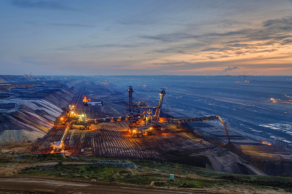 Stacker in the Garzweiler open pit in the blue hour, Grevenbroich, North Rhine-Westphalia, Germany, Europe