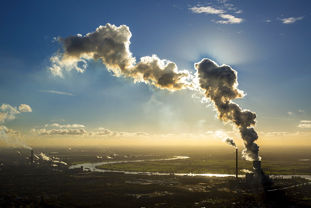 Coal plant Kraftwerk Duisburg-Walsum in front of the Rhine, backlit, cloud of smoke, emissions, Ruhr district, Duisburg, North Rhine-Westphalia, Germany, Europe