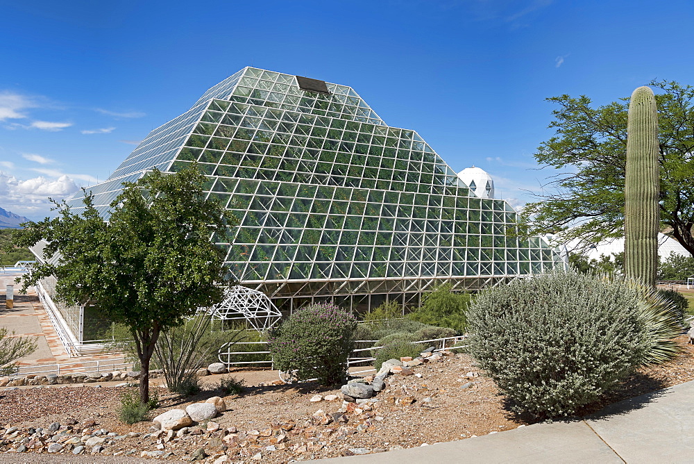 Biosphere 2, self-sustaining ecosystem, cactus in front of facility with tropical rainforest, Oracle, Arizona, USA, North America