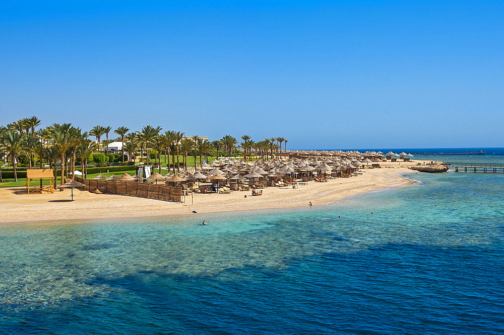 Beach with umbrellas, Port Ghalib, Marsa Alam, Red Sea, Egypt, Africa