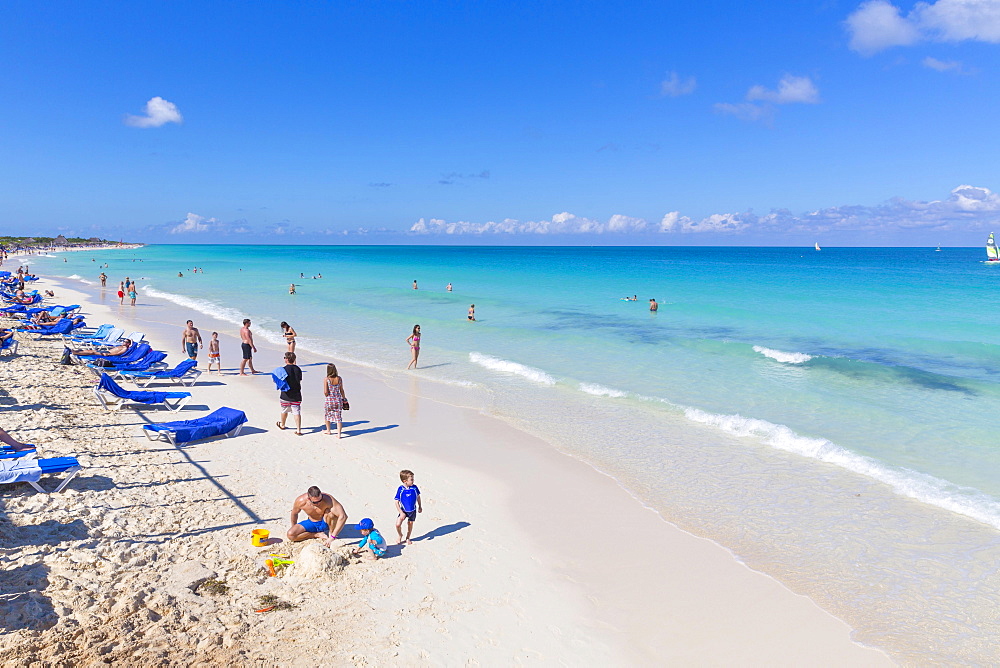 Tourists on the sandy beach with turquoise water, Hotel Melia Las Dunas, island of Cayo Santa Maria, Caribbean, Cuba, Central America