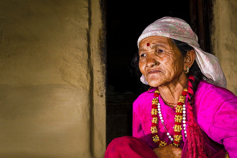 Portrait, old, wrinkled native woman, wearing pink shirt, Ghandruk, Kaski District, Nepal, Asia