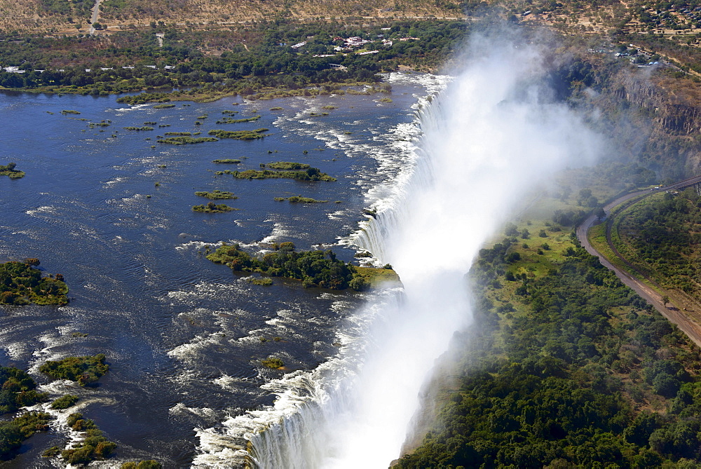 Aerial View, Zambezi river flows into the Victoria Falls, border of Zambia and Zimbabwe, Africa