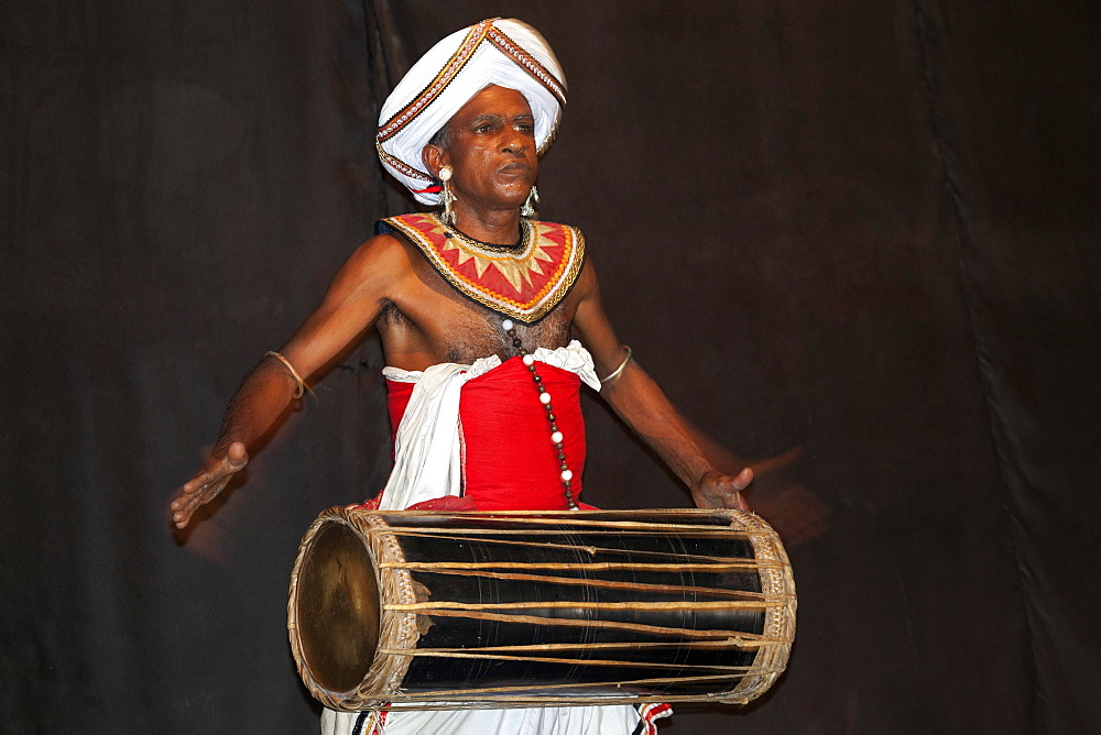 Drummer in traditional costume, Kandy, Central Province, Sri Lanka, Asia