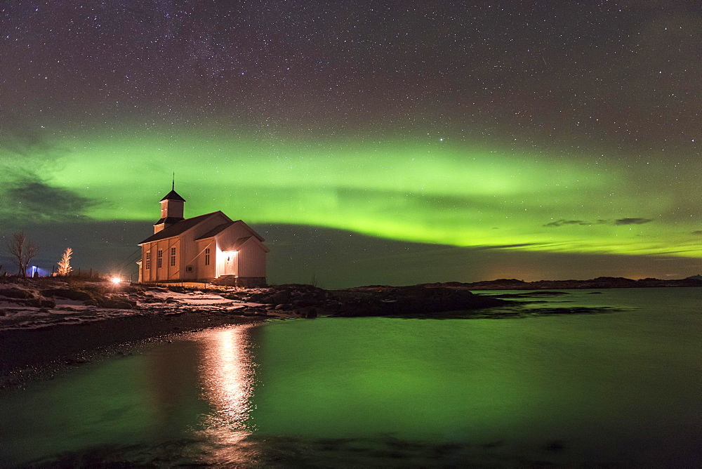 Church at the coast with northern lights, Gimsoy, Lofoten, Norway, Europe