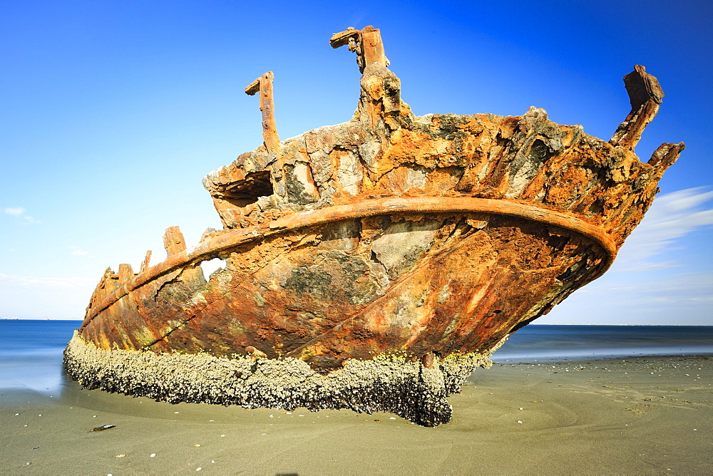 Rusty shipwreck on the beach, Pelican Point, Skeleton Coast, Erongo region, Namibia, Africa