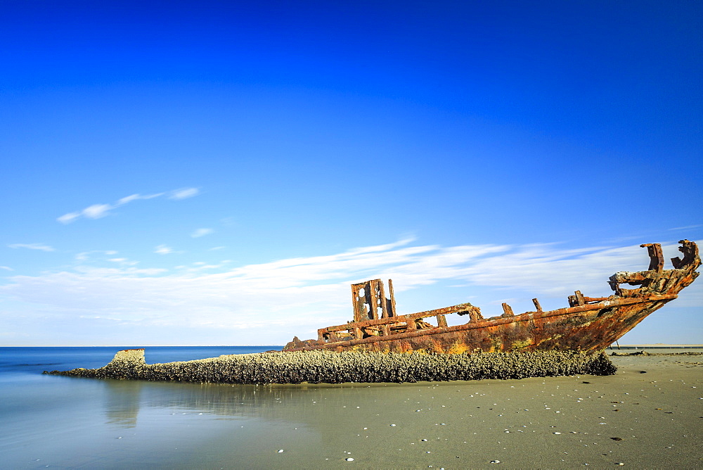 Rusty shipwreck on the beach, Pelican Point, Skeleton Coast, Erongo region, Namibia, Africa