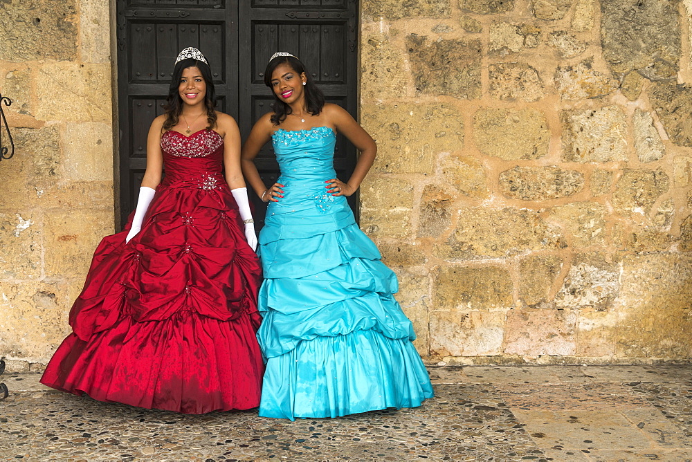 Young women in festive dress celebrate their 15th birthday, the Quinceanera or Quince, capital Santo Domingo, Dominican Republic, Central America