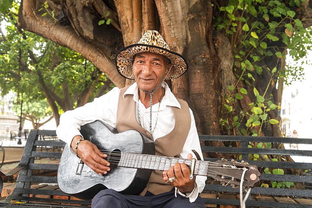 Street musician with guitar, Santo Domingo, Dominican Republic, Central America