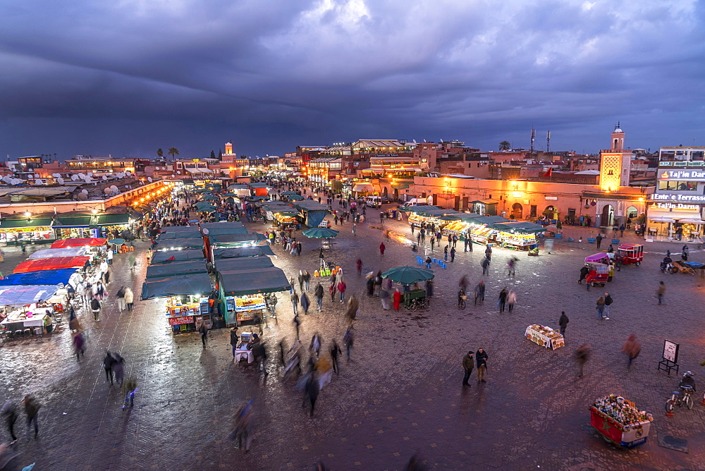 Djemaa el Fnaa market square at dusk, Marrakech, Morocco, Africa