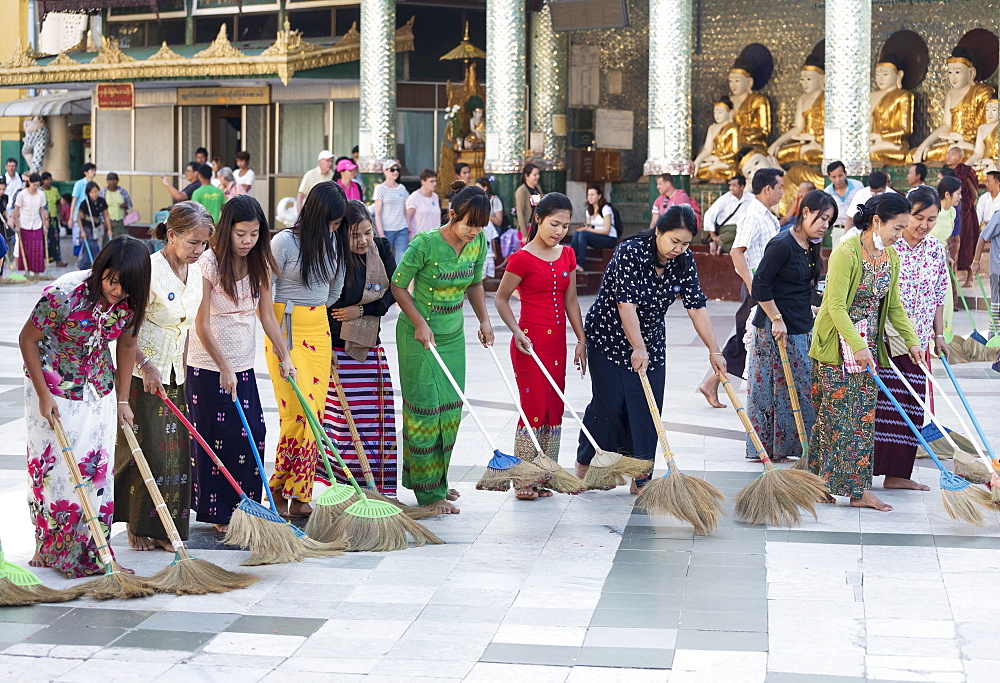 Burmese women sweeping the floor of the Shwedagon Pagoda, Yangon, Rangoon, Myanmar, Asia