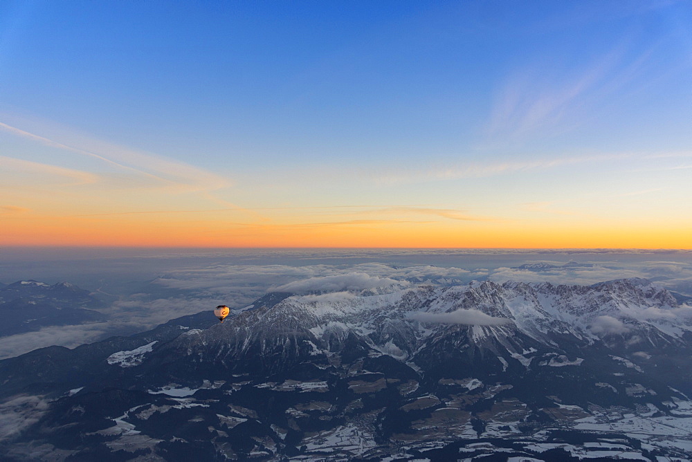 Morning light, sunrise during a balloon ride, view of the Alps, position about 5400 m above sea level, over Neukirchen am Großvenediger, Viewing direction Westendorf and Kitzbühel, Austria, Europe