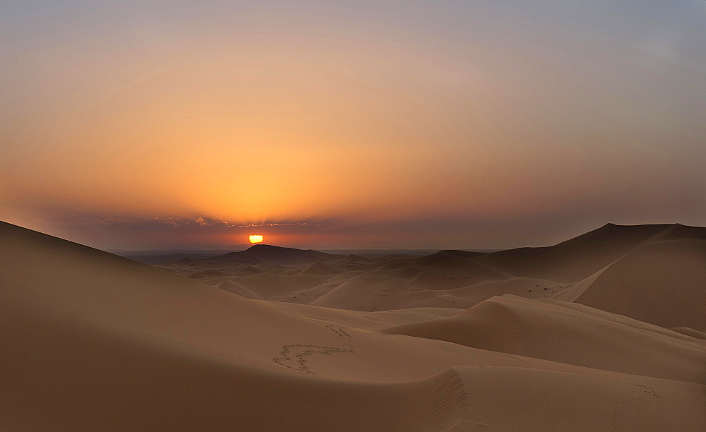 Sunset on the dunes of Tanamoust, Sahara, Morocco, Africa