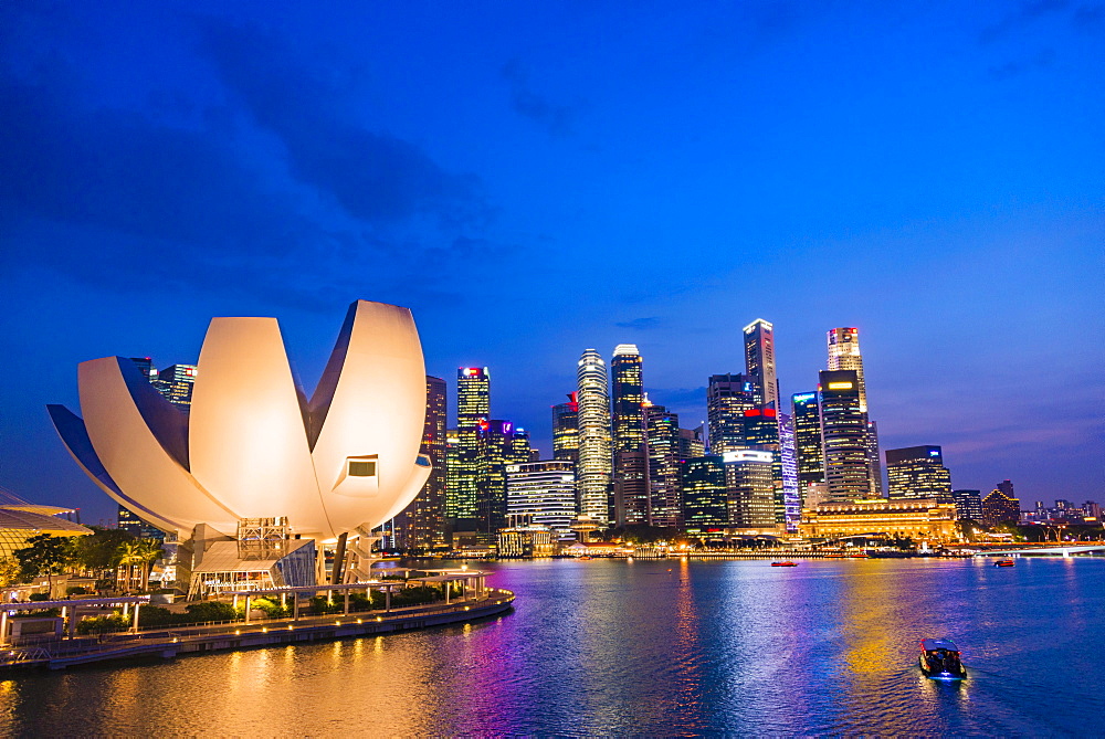 ArtScience Museum and skyline at dusk, night scene, city centre, financial district, Marina Bay, Downtown Core, Singapore, Asia