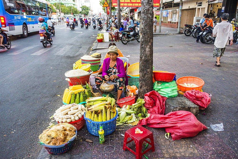 Woman selling vegetables by the roadside, Ho Chi Minh City, Ho Chi Minh City, Vietnam, Asia