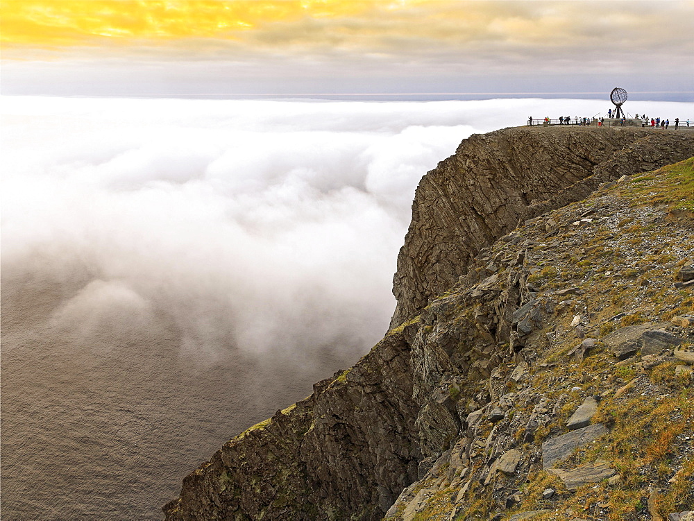 Slate plateau, rocky coast with North Cape platform and globe in the evening, Nordkapplatået, Nordkapp, Magerøya, Finnmark County, Norway, Europe