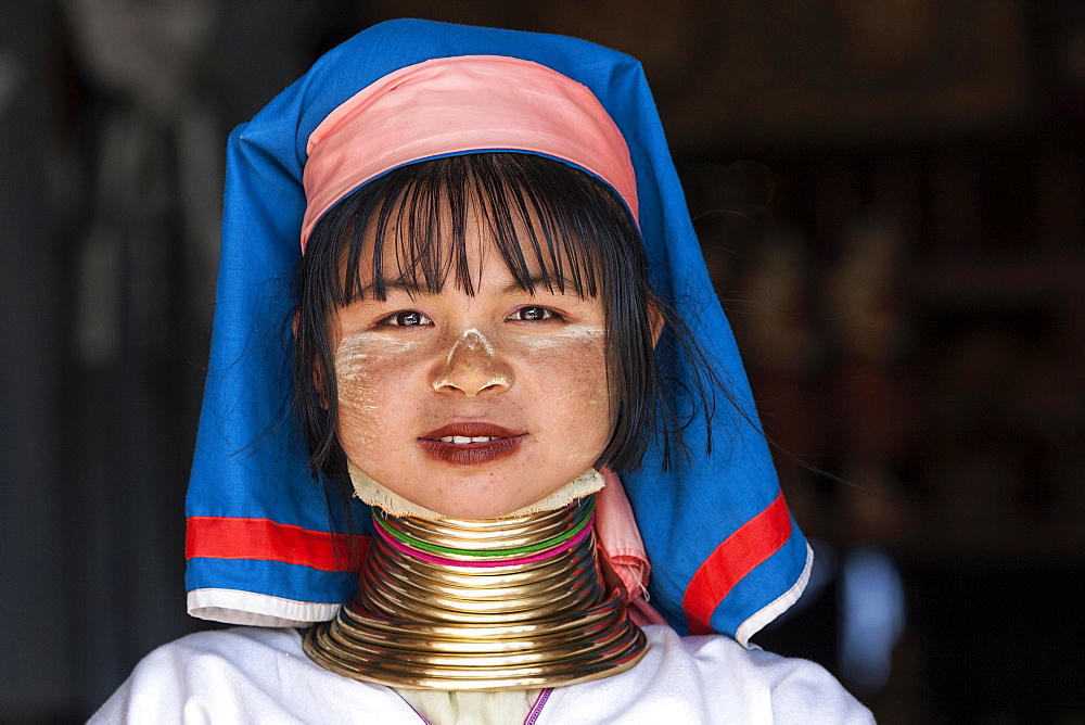 Girl of the Padaung ethnic group wearing traditional clothing, portrait, at Indein, Shan State, Myanmar, Asia